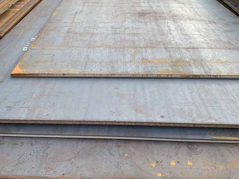 Project manager checking steel production on tablet