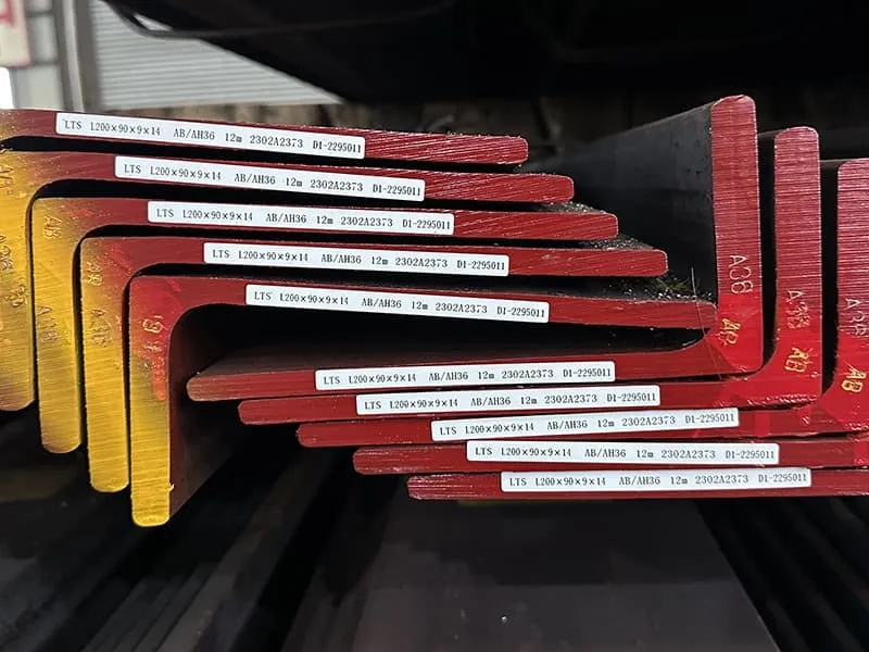 Labeled diagram of an L-shaped steel angle showing leg length and thickness