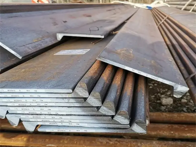 side-by-side comparison of marine carbon steel plate and stainless steel fittings
