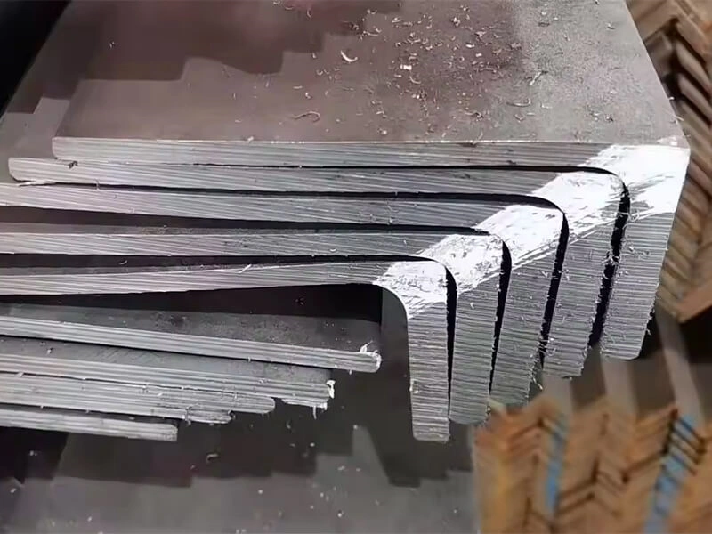 Graph showing a stress-strain curve for steel, highlighting that the yield strength point is the same in both tension and compression