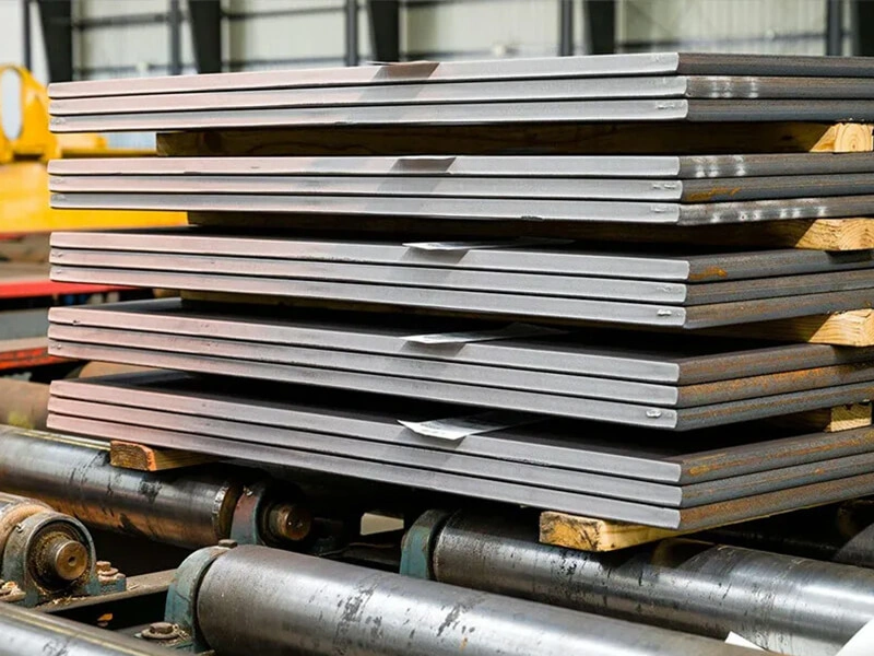 raw materials iron ore and steel coils at mill