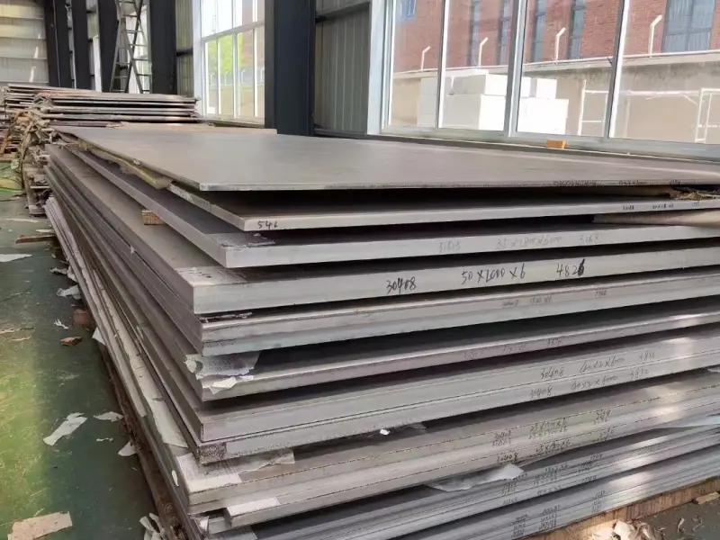 Surplus steel plates rusting in a yard with a calculator showing wasted cost
